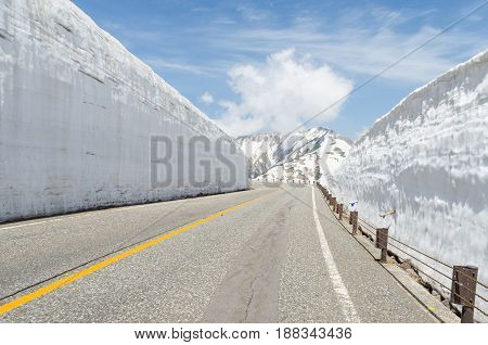 Empty road and snow wall at japan alps tateyama kurobe alpine route