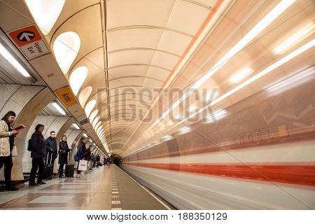 Prague, Czech Republic - March 20, 2017: People waiting for the subway at Andel metro station