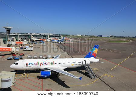 Amsterdam The Netherlands - May 26th 2017: D-ABDB Small Planet Airlines Germany Airbus A320 at the gate at Schiphol International Airport