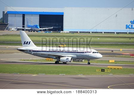 Amsterdam The Netherlands - May 26th 2017: OY-KBO SAS Scandinavian Airlines Airbus A319 in SAS retro livery at Schiphol International Airport
