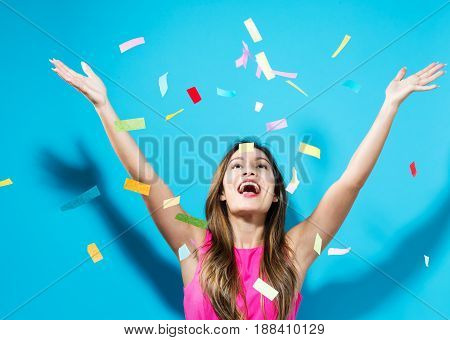 Happy Woman Celebrating With Confetti