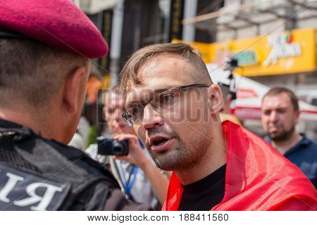 KIEV UKRAINE - JULY 27 2016 : Detention of a member of the volunteer battalion Sich national police during religious procession parishioners Ukrainian Orthodox Church Moscow Patriarchate