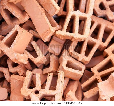Pile of broken silicate bricks. Close up.