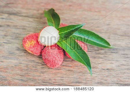 Fresh Litchi Fruit On An Old Wooden Background