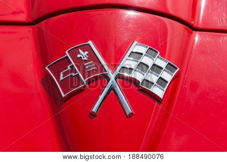 BERLIN GERMANY - MAY 17 2014: Emblem sports car Chevrolet Corvette Sting Ray (C2). 27th Oldtimer Day Berlin - Brandenburg