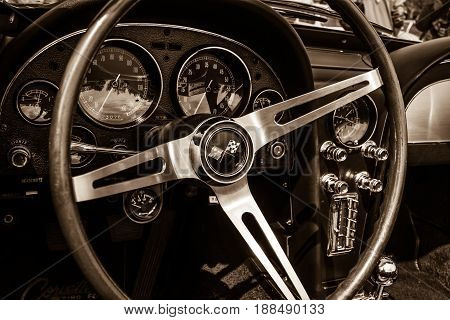 BERLIN GERMANY - MAY 17 2014: Cab of the sports car Chevrolet Corvette Sting Ray (C2). Sepia. 27th Oldtimer Day Berlin - Brandenburg