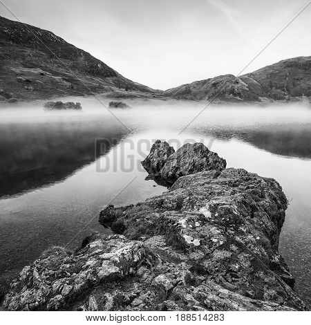 Stunning Winter Foggy Sunrise On Crummock Water In Lake District England