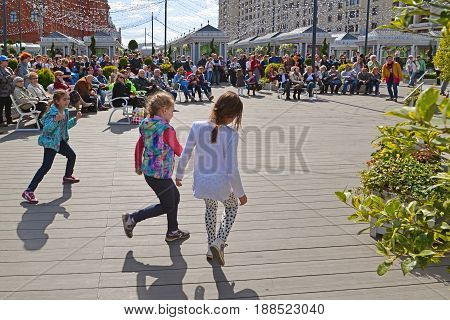Moscow, Russia - may 06.2017. People listen to music at a festival acappella Moscow Spring on Revolution square