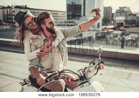 Couple On Scooter