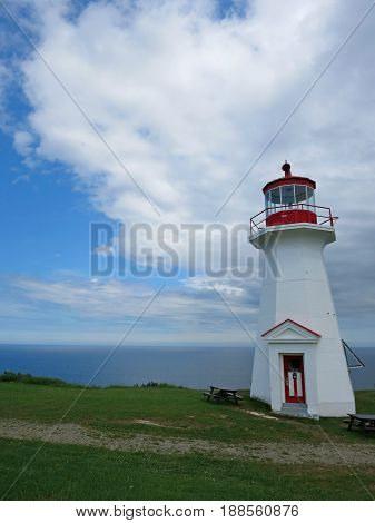 gaspesie lighthouse at cape gaspe, quebec canada