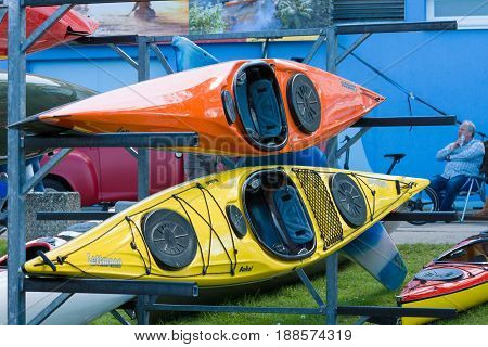 BERLIN GERMANY - MAY 03 2014: Sport boats kayaks and canoes at the marina. 2nd Berlin watersports festival in Gruenau on the river Dahme tributary of the river Spree