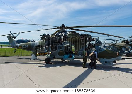 BERLIN GERMANY - MAY 21 2014: Attack helicopter with transport capabilities Mil Mi-24 Hind. Czech Air Force. Exhibition ILA Berlin Air Show 2014