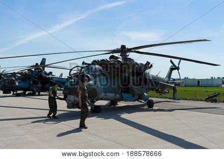 BERLIN GERMANY - MAY 21 2014: Attack helicopter with transport capabilities Mil Mi-24 Hind. Czech Air Force. Exhibition ILA Berlin Air Show 2014