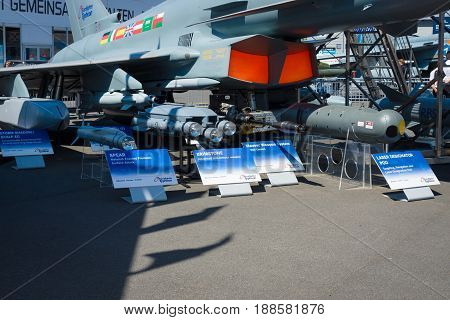 BERLIN GERMANY - MAY 21 2014: Multirole fighter Eurofighter Typhoon and samples of armament. Exhibition ILA Berlin Air Show 2014