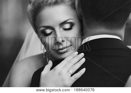 Stunning Bride Llies Her Head On Man's Shoulder