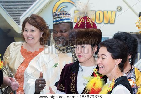 Moscow Russia - May 21 2017: Guests of the international conference of the FOHOW company in traditional costumes.