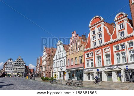 LUNEBURG, GERMANY - MAY 21, 2017: Shops at the central square Am Sande in Luneburg, Germany