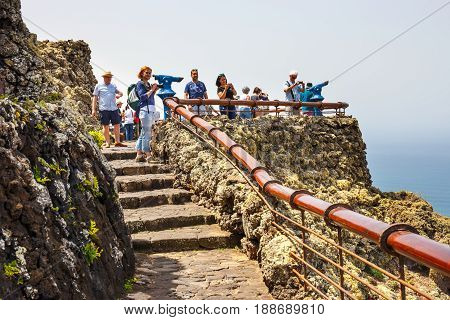 Mirador del Rio Lanzarote March 31 2017: People enjoing Impressive view from Mirador del Rio to island of La Graciosa Lanzarote Canary islands