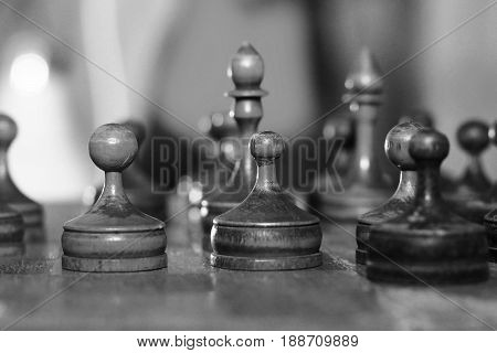 Wooden old chess, developing board game. Retro.