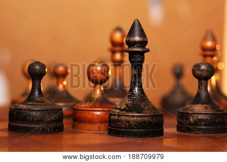 Wooden old chess, developing board game. Retro.