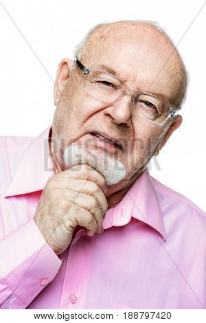 Angry old man expresses his dissatisfaction. Social protection, rights of pensioners. Isolated over white. Copy space.