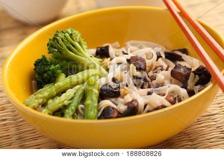 Udon noodle soup with mushroms, asparagus, and broccoli