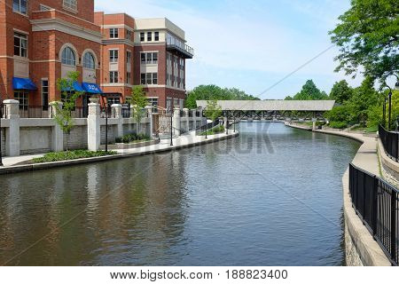 NAPERVILLE, ILLINOIS - MAY 26, 2017: Riverwalk along the West Branch of the DuPage River through Naperville, Illinois.
