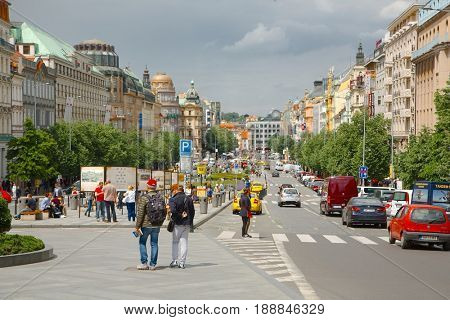 PRAGUE, CZECH REPUBLIC - MAY 20, 2016: People walking around on Vaclavske Namesti on a bright spring day in Prague