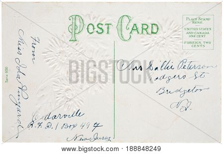 BRIDGETON, NEW JERSEY, USA - CIRCA EARLY 1900s: Unstamped post card with embossing with mailing and return addresses in ink