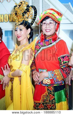 Moscow Russia - May 21 2017: Guests of the international conference of the FOHOW company in traditional chinese costumes