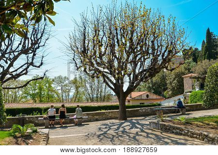 People Relaxing At Garden Franciscan Monastery