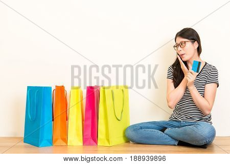 Young Woman Shopping Online Through Credit Card