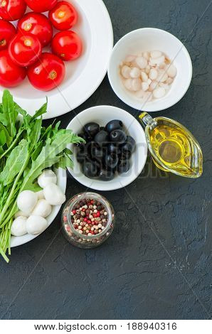 Ingredients For Healthy Salad. Tomatoes, Rucola (eruca Sativa), Spring Onion, Mozzarella, Olives, Ga