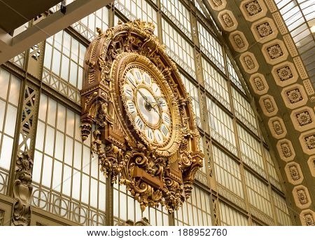 Paris, France, March 31 2017: Golden clock of the museum D'Orsay.The Musee d'Orsay is a museum in Paris, on the left bank of the Seine