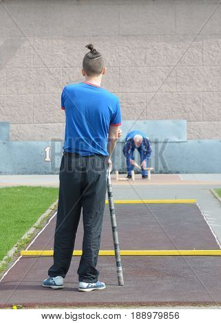 21.05.2017.Russia.Saint-Petersburg.Gorodki - a Russian folk sports game. In this game you need specific distances to smash figures made in different ways from five wooden cylinders.