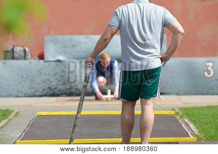 21.05.2017.Russia.Saint-Petersburg.Gorodki - a Russian folk sports game. In this game you need specific distances to smash figures made in different ways from five wooden cylinders.