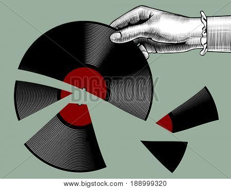 Woman's hand with a broken gramophone record. Retro music concept. Vintage stylized drawing