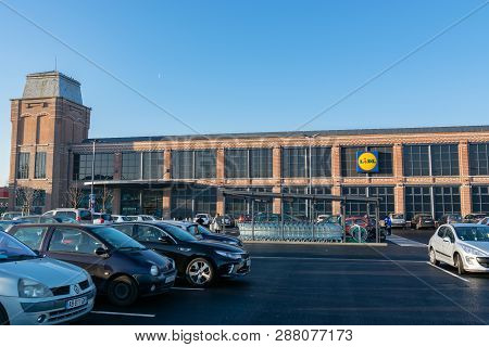 Tourcoing,france-february27,2019:opening Day Of A Large Lidl Supermarket,a Red Brick Building Transf