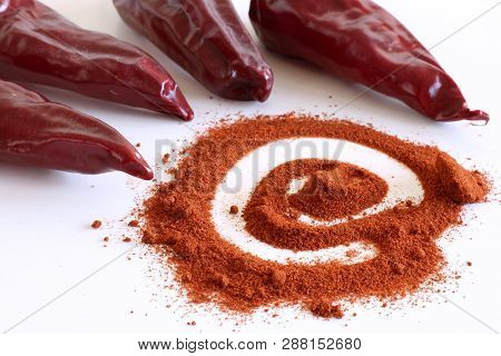 Red Pepper Chili Piment Despelette And Pile Of Red Powder Isolated On White Background.food Concept.