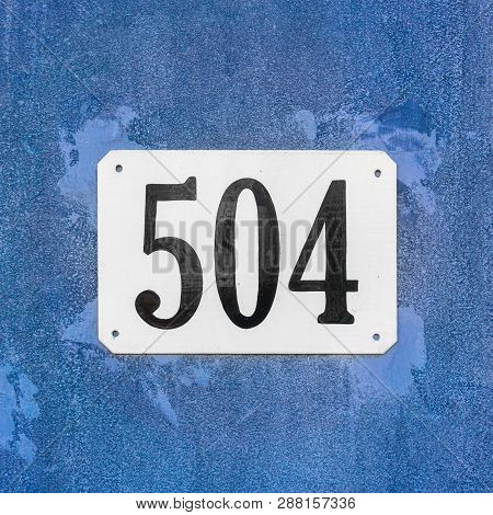 House Number Five Hundred And Four (504) On A Blue Background