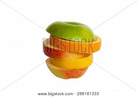 Fruit Mix. Red Apple, Green Apple, Orange And Lemon. Various Type Of Fruit Slices Stacked With Splas