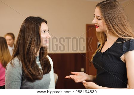 Make Up Artist Doing Professional Make Up Of Young Woman. Beauty Shcool