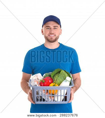 Delivery Man Holding Plastic Crate With Food Products On White Background