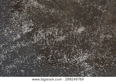 Deicing Chemicals On Asphalt Road In Moscow
