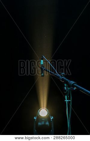 Stage Lights. Several Projectors In The Dark. Multi-colored Light Beams From The Stage Spotlights On