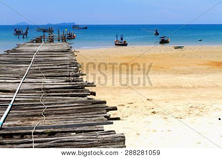 Beach With Old Bridge And Sunlight At Bang Boet Beach At Chumphon Province Thailand Is Famous For Tr