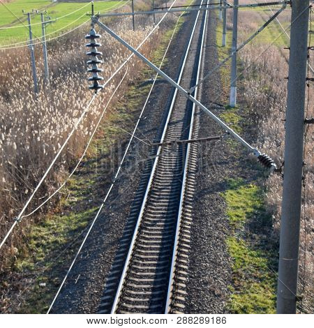 Plot Railway. Top View On The Rails. High-voltage Power Lines For Electric Trains.
