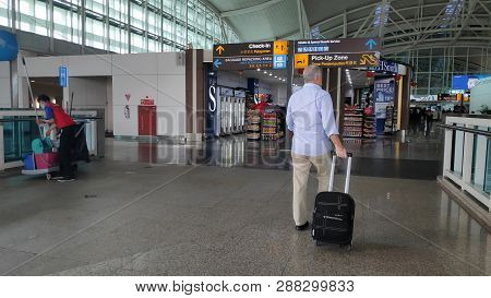 Bali, Indonesia- 14 Feb, 2019: Tourist Leaving Bali Via Ngurah Rai Airport In Bali. Ngurah Rai Is Th