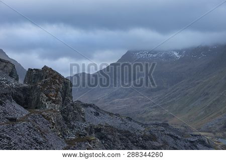 Landscape Image Of Dinorwig Slate Mine Discused Quarry In Snowdonia Showing Scale Of Works And Tiny 