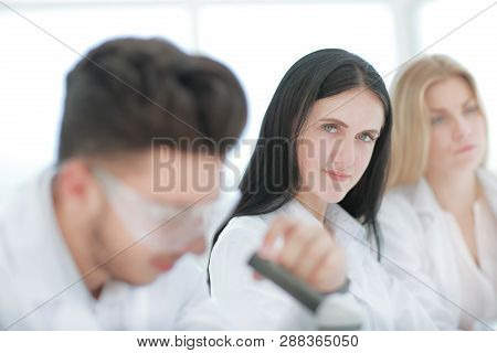 Close Up.modern Woman Scientist In The Workplace In The Laboratory.